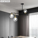 GobekUsa Modern Clear Glass Pendant Light Fixture: 3-Bulb Globe Island Lighting in Black for Dining Room