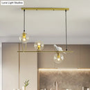 GobekUsa Modern Clear Glass Pendant Light Fixture with White Bird - Global Island Lamp, Gold Trim, 3 Heads