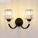 GobekUsa Modern Crystal Wall Lamp: Clear Barrel with Curved Arm in Black/Gold - 1/2-Light Wall Mounted Lighting
