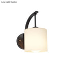GobekUsa Modern Cylindrical Wall Sconce with Black Finish and Opal Glass Shade
