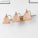 GobekUsa Modern Floral Wall Sconce with Amber Glass, Brass Finish, 2/3 Bulbs - 16.5"/24.5" W
