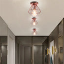 Modern geometric iron frame cage ceiling light for aisle and loft by Decorbites