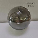 Modern geometric magic bean lighting – smoke & amber dining room globe by Decorbites