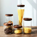 Modern glass hermetic storage jars with dark wood airtight lids kitchen by Decorbites