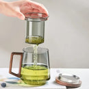 Modern glass tea cup with wood handle for kitchen drinking by Decorbites