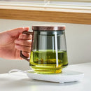 Modern glass tea cup with wood handle for kitchen drinking by Decorbites