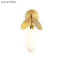 GobekUsa Modern Globe/Oval Wall Mount Lamp with Cream Glass - Brass Bedside Wall Light with Leaf Deco