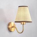 Modern gold and beige cloth led wall lamp bedroom sconce by Decorbites