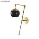 GobekUsa Modern Clear/Black Glass Ball Wall Sconce Light Fixture with Metal Arm - Bedside Lighting