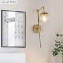 GobekUsa Modern Clear/Black Glass Ball Wall Sconce Light Fixture with Metal Arm - Bedside Lighting