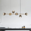 GobekUsa Contemporary Smoke Gray Glass Globe Hanging Light Fixture - 6 Head Gold Island Light