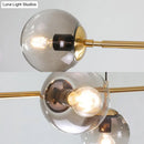 GobekUsa Contemporary Smoke Gray Glass Globe Hanging Light Fixture - 6 Head Gold Island Light