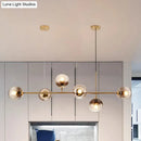 GobekUsa Contemporary Smoke Gray Glass Globe Hanging Light Fixture - 6 Head Gold Island Light
