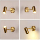 Modern gold & black cylindrical led wall lamp for living room by Decorbites