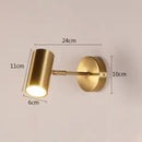 Modern gold & black cylindrical led wall lamp for living room by Decorbites