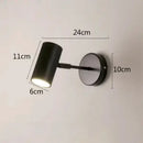 Modern gold & black cylindrical led wall lamp for living room by Decorbites