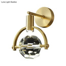 GobekUsa Translucent Crystal LED Wall Lamp with Modern Gold Finish and Beveled Design