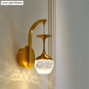 GobekUsa Modern LED Wall Light with Gold Cup Design, Crystal Shade, and Metallic Fixture