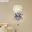 GobekUsa Globe Cutout Metal Shade Crystal Wall Sconce in Gold with Dropped Crystal Ball Accent