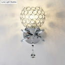 GobekUsa Globe Cutout Metal Shade Crystal Wall Sconce in Gold with Dropped Crystal Ball Accent