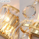 GobekUsa Golden Curved Metal Wall Sconce with Clear Crystal Prism