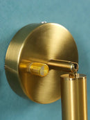 Modern gold cylindrical led wall lamp for bedroom with knob switch by Decorbites
