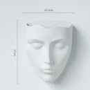 Modern gold face ceramic wall-mounted vase living room decor by Decorbites