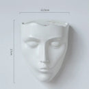 Modern gold face ceramic wall-mounted vase living room decor by Decorbites