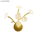 GobekUsa Modern Gold Wall Sconce: Floral Bedside Lamp with Transparent Glass and 6 Bulbs