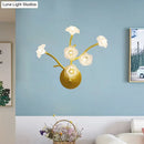 GobekUsa Modern Gold Wall Sconce: Floral Bedside Lamp with Transparent Glass and 6 Bulbs