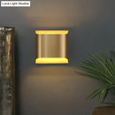 GobekUsa Gold Metal LED Wall Light with Modern Cut Geometry – Ideal for Bedside Ambiance
