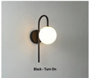 Modern gold glass ball led wall sconce for living room lighting by Decorbites