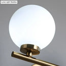 GobekUsa Modern Opal Glass Wall Sconce with Globe Shade and Gold Accent for Washroom Lighting