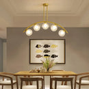 GobekUsa Gold Island Pendant with Clear/White Shade and Curvy Design - Perfect for Modern Kitchens (3/5/7 Lights)