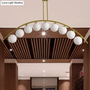 GobekUsa Gold Island Pendant with Clear/White Shade and Curvy Design - Perfect for Modern Kitchens (3/5/7 Lights)