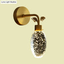 GobekUsa Modern Gold LED Wall Sconce with Clear Seeded Crystal and Leaf Design - Bedroom Wall Light