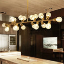 GobekUsa Contemporary Gold Linear LED Island Lighting - 18 Lights Hanging Ceiling Lamp with Ribbing Glass Shade