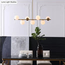 GobekUsa 7-Light Modern Gold Metal Island Pendant with Spherical White Glass - Ideal for Dining Table