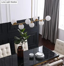 GobekUsa 7-Light Modern Gold Metal Island Pendant with Spherical White Glass - Ideal for Dining Table