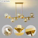 GobekUsa Mid-Century Modern Gold Metal Pendant with Spherical Amber Glass - Island Ceiling Light for Dining Table