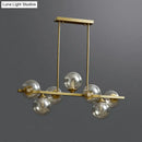 GobekUsa Mid-Century Modern Gold Metal Pendant with Spherical Amber Glass - Island Ceiling Light for Dining Table