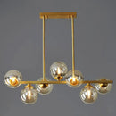 GobekUsa Mid-Century Modern Gold Metal Pendant with Spherical Amber Glass - Island Ceiling Light for Dining Table