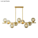 GobekUsa Mid-Century Modern Gold Metal Pendant with Spherical Amber Glass - Island Ceiling Light for Dining Table