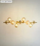 GobekUsa Mid-Century Modern Gold Metal Pendant with Spherical Amber Glass - Island Ceiling Light for Dining Table
