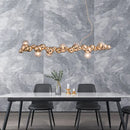 GobekUsa Modern Gold Metal Pendant Lighting with Glass Spherical Shade - Ideal for Dining Table or Island Ceiling
