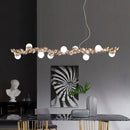 GobekUsa Modern Gold Metal Pendant Lighting with Glass Spherical Shade - Ideal for Dining Table or Island Ceiling