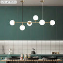 GobekUsa Modern Gold Metal Island Pendant Lighting with 6 Lights and Spherical Glass for Dining Table