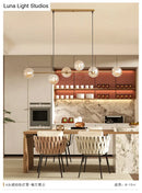 GobekUsa Modern Gold Metal Island Pendant Lighting with 6 Lights and Spherical Glass for Dining Table