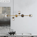 GobekUsa Modern Gold Metal Island Pendant Lighting with 6 Lights and Spherical Glass for Dining Table