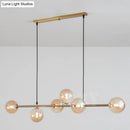 GobekUsa Modern Gold Metal Island Pendant Lighting with 6 Lights and Spherical Glass for Dining Table